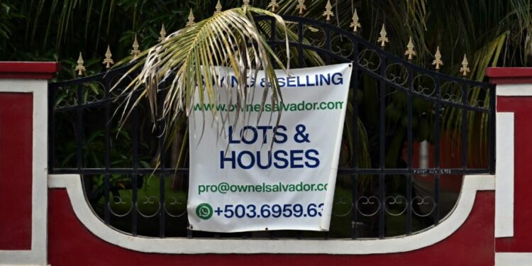 A sign advertising property in El Salvador.