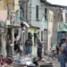 Getty Images Police officers collect evidence to clarify the cause of the explosion recorded on Tenth Street, between H and I, Cristo del Consuelo neighbourhood on August 14, 2022 in Guayaquil, Ecuador.