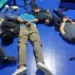 Reuters People accused of invading and taking over television station TC with weapons and forcing staff to lie and sit down, lie handcuffed on the floor in a police handout, in Guayaquil, Ecuador, January 9, 2024
