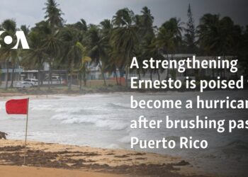 Ernesto becomes a hurricane after brushing past Puerto Rico