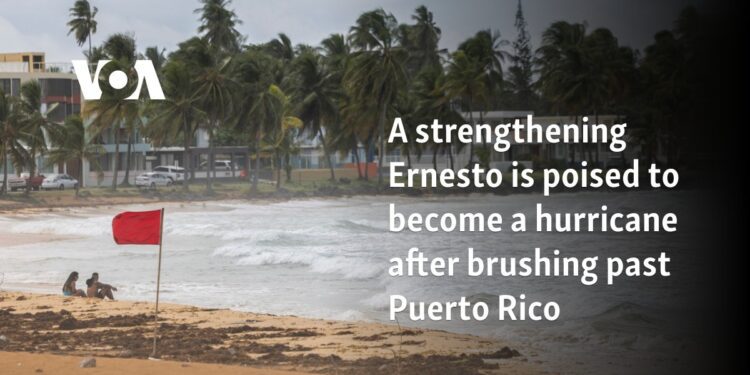 Ernesto becomes a hurricane after brushing past Puerto Rico
