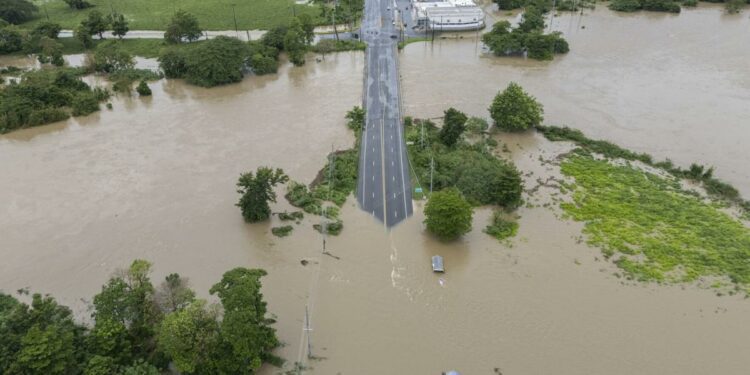 Ernesto slams Puerto Rico; inflation falls to 3-year low