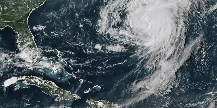 Hurricane Ernesto makes landfall on wealthy British territory of Bermuda