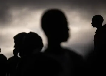 Sub-Saharan migrants dey waka around di outskirts of Las Raices Camp for Tenerife, Canary Islands, Spain for 2023.