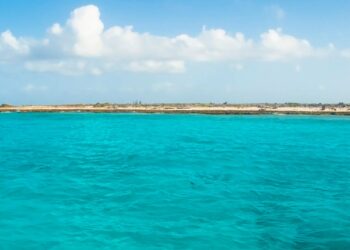 Inside desolate & isolated Caribbean island’s dark history with shipwrecks, graves and an abandoned lighthouse
