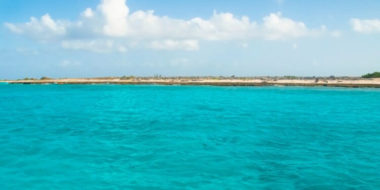 Inside desolate & isolated Caribbean island’s dark history with shipwrecks, graves and an abandoned lighthouse