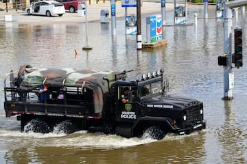 A police rescue vehicle drives through flood waters after Hurricane Beryl passed in Houston, Texas, U.S. July 8, 2024. REUTERS/Rich Matthews