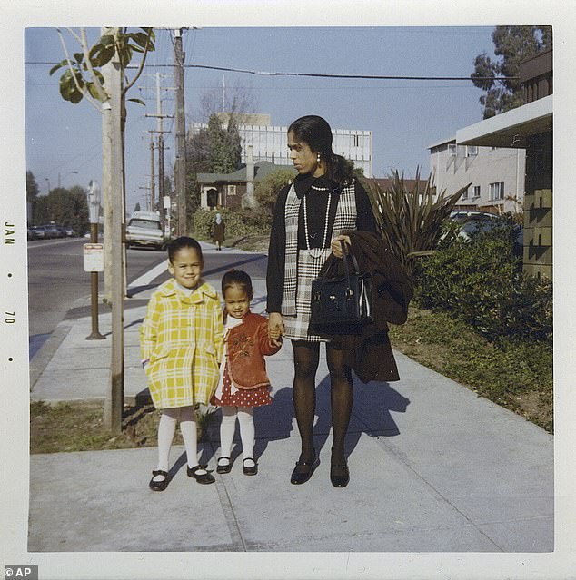 The editor added that the 'Italian left' is wrongly accusing him of confusing Harris' ethnicity. She is pictured with her mother and younger sister