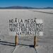 A sign reading: 'No to mega-mining. Let's take care of natural resources,' is seen at Salinas Grandes salt flat, Jujuy province, Argentina on July 2, 2024.
