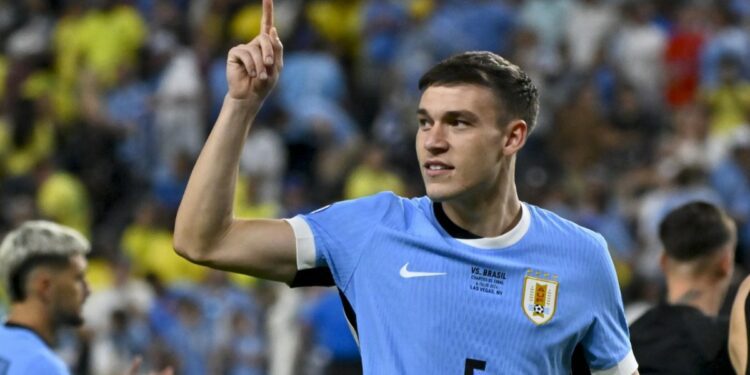 Man United signs Uruguay midfielder Ugarte from PSG for $55M to take summer spending to $240M
