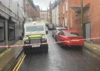 BBC Police vehicles pictured at the scene following the fire in Harvey Street