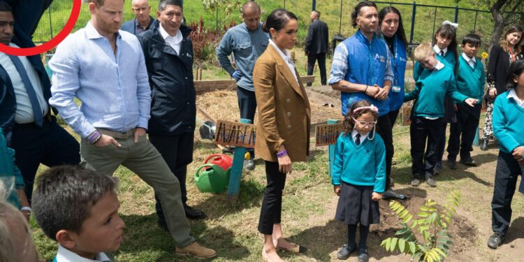 Meghan & Harry shielded by 'ballistic briefcase' on trip to Colombia school as pair assigned 'immense' army of security