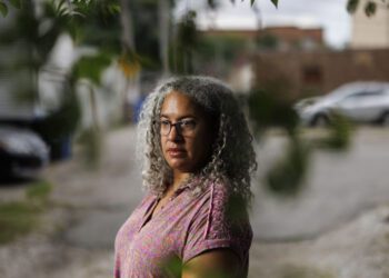 Jennifer Leigh Husbands, 51, is shown near her home Aug. 1 in Chicago. Husbands is Caribbean American; her mother is from Michigan and her father is from Barbados. (Armando L.