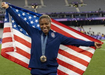 Circular arrangement of various sneakers with text "49 SILHOUETTES ACROSS 41 DISCIPLINES" by Adidas