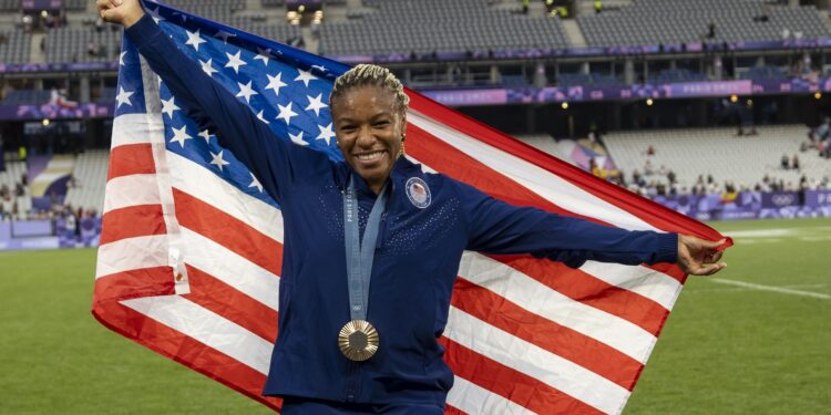 Circular arrangement of various sneakers with text "49 SILHOUETTES ACROSS 41 DISCIPLINES" by Adidas