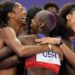 Women's 4x400 meter runners for Team USA celebrate gold at Paris Olympics...