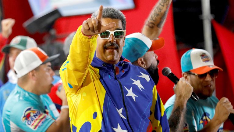 Venezuelan President Nicolas Maduro celebrates after the presidential election in Caracas.
Pic: Reuters