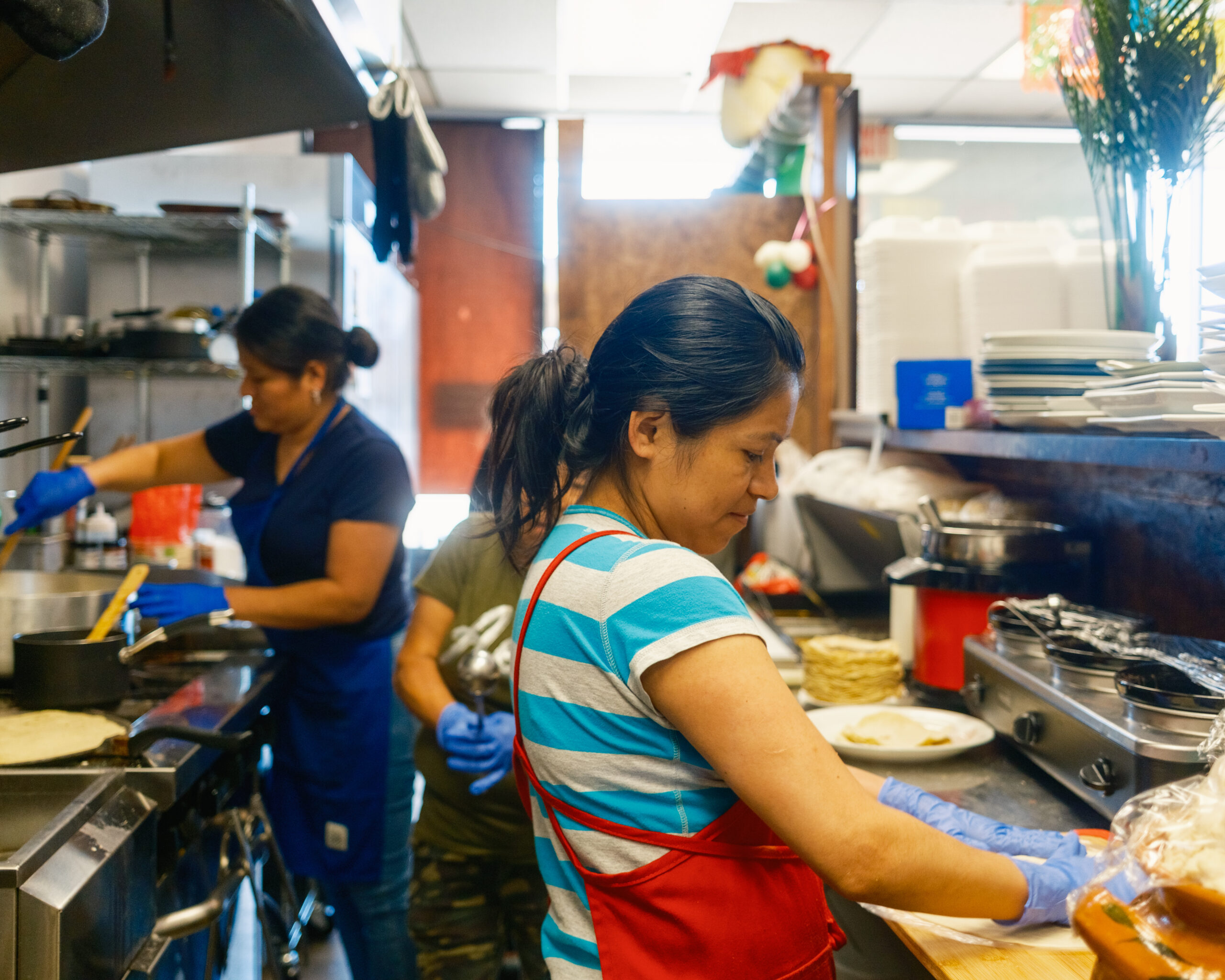 two people in a kitchen