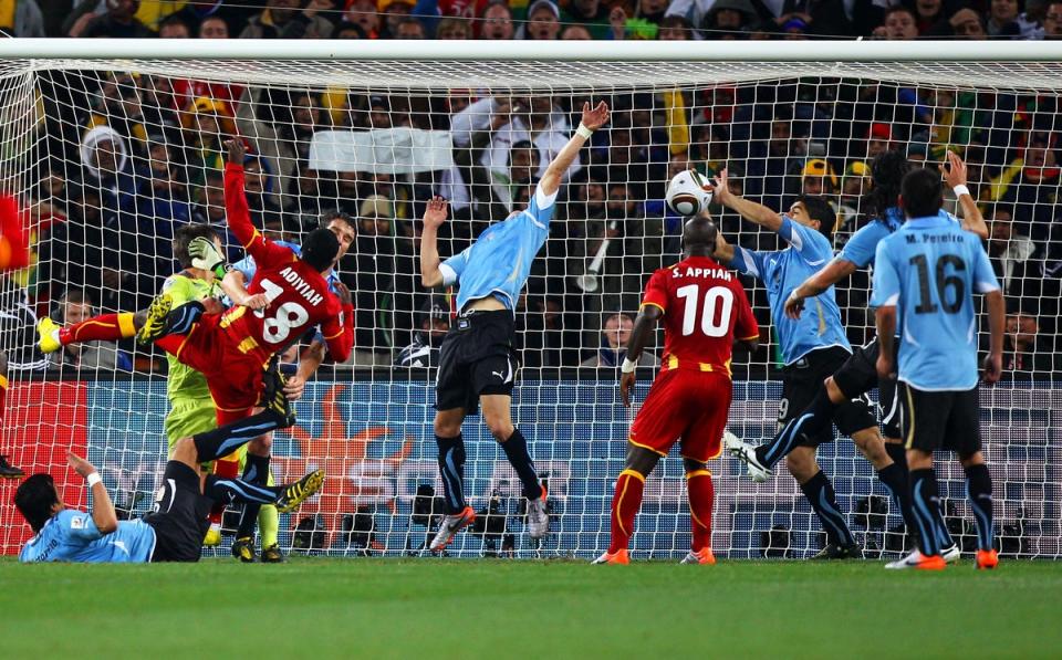 Luis Suarez of Uruguay handles the ball on the goal line, for which he is sent off (Getty Images)