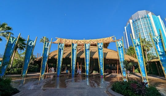 Wide-angle view of the entrance to a tropical-themed park named 