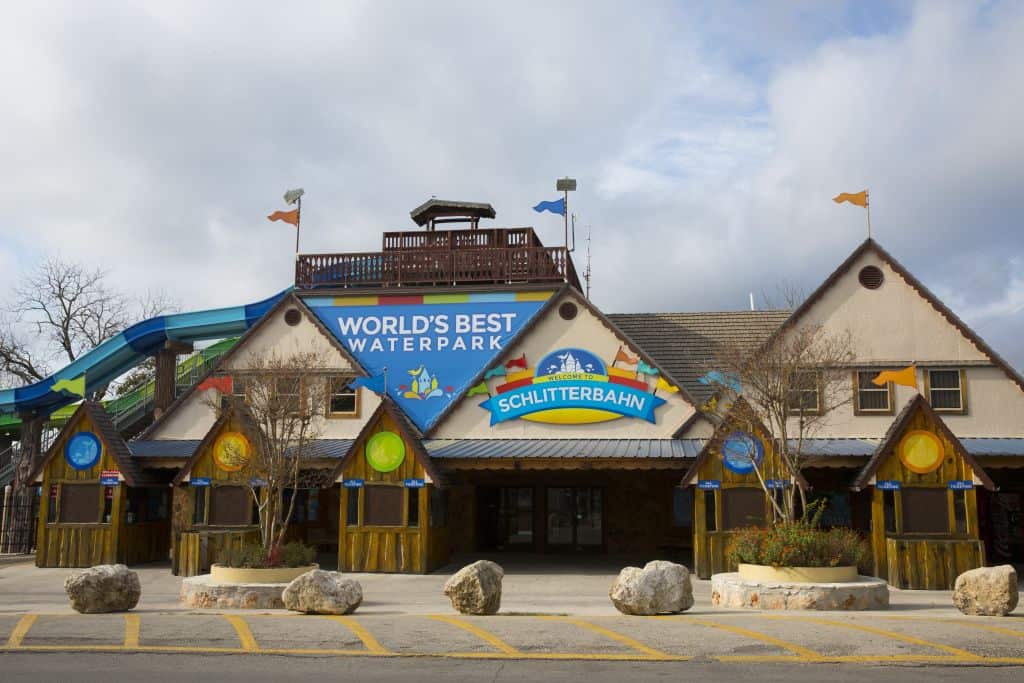 Front exterior view of Schlitterbahn Waterpark with a sign reading 