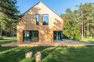 House in Suurupi by studio argus and its clean timber surfaces of minimalist light wood and white colours