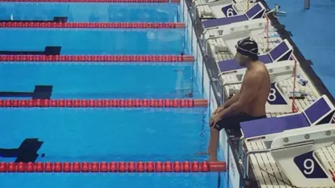 Shardea Arias de la Cruz Jesus De Marchena Acevedo sitting on the poolside at Rio