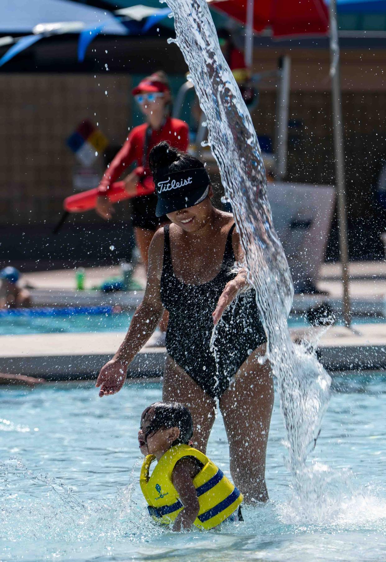 Two-year-old Graysyn-Jade Sciarani and mom Nadine-Angela Sciarani cool off at the Eldorado Aquatic and Fitness Center in Scottsdale on July 27, 2024.