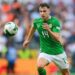 Jayson Molumby of Republic of Ireland chases the ball in the green Irish home kit in the 2024 Nations League.