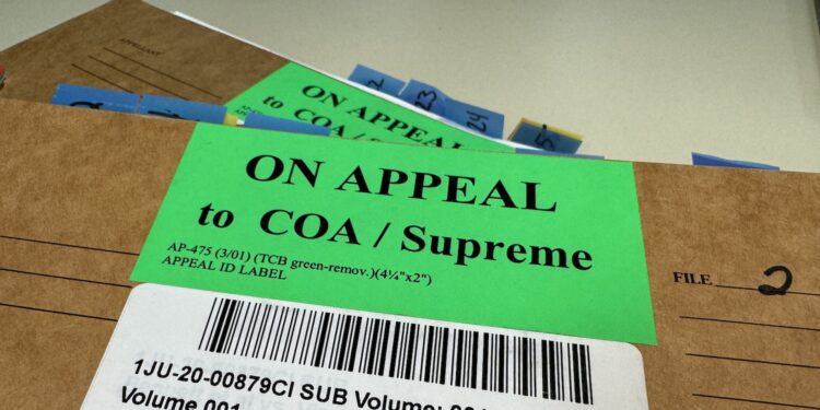 Alaska Supreme Court considers legal challenge to imprisoned out-of-state Democrat's U.S. House run