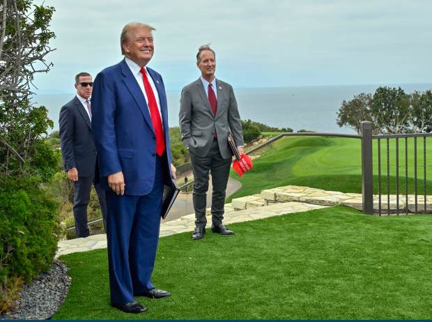 Former President Donald Trump and John Cruikshank, mayor of Rancho...