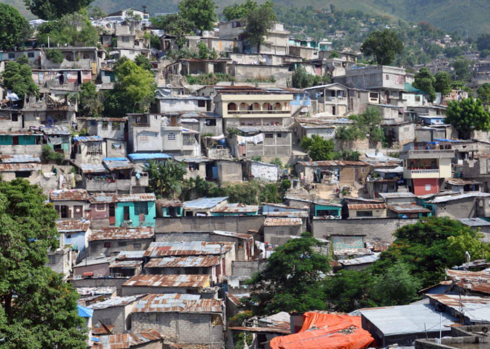 A distant view of homes on a hillside in Haiti.