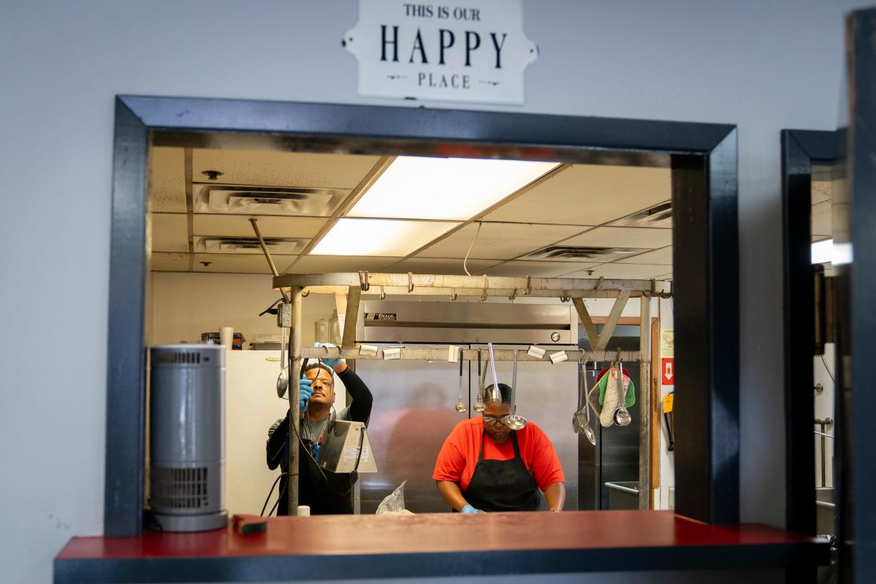 Obie Washington (left) and Michelle Ellis (right) prepare the kitchen for service at Melon Patch, a restaurant operated by Rainbow of Challenges of Hope, which gives employment opportunities to residents with developmental disabilities, in Hope, Arkansas. Jasper Colt, USA TODAY