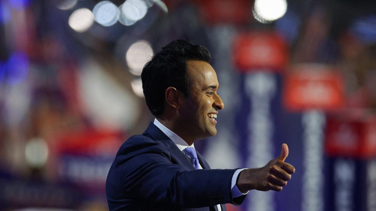 Vivek Ramaswamy gives a thumbs up from the stage on Day 2 of the Republican National Convention