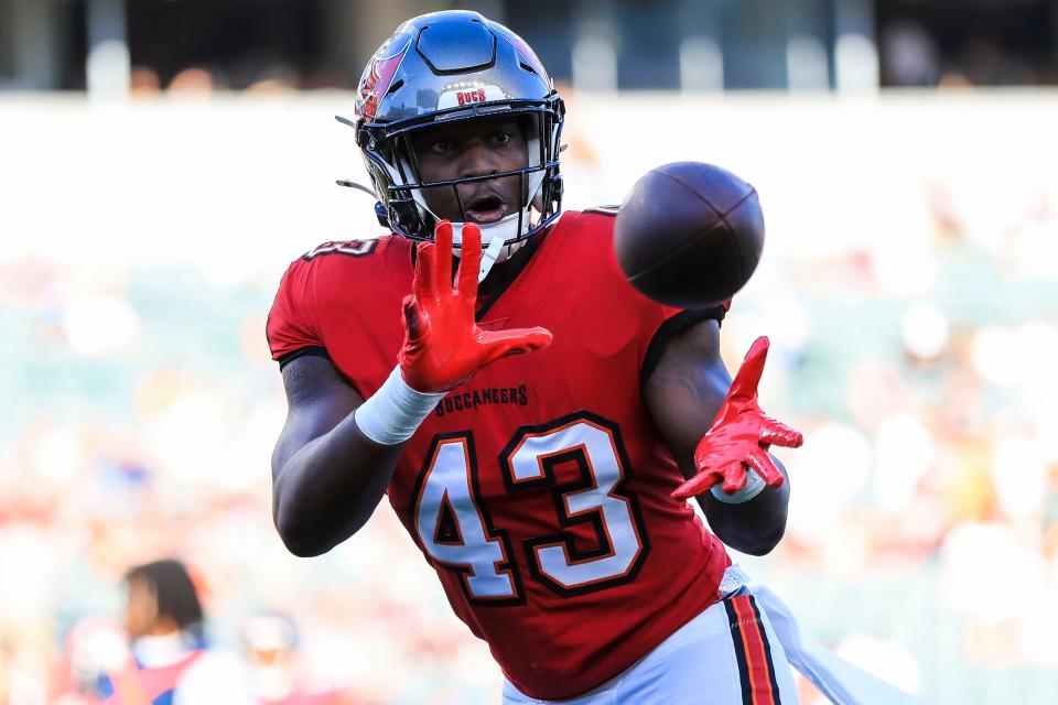 Aug 10, 2024; Cincinnati, Ohio, USA; Tampa Bay Buccaneers linebacker Chris Braswell (43) catches a pass during warmups before the game against the Cincinnati Bengals at Paycor Stadium. Mandatory Credit: Katie Stratman-USA TODAY Sports