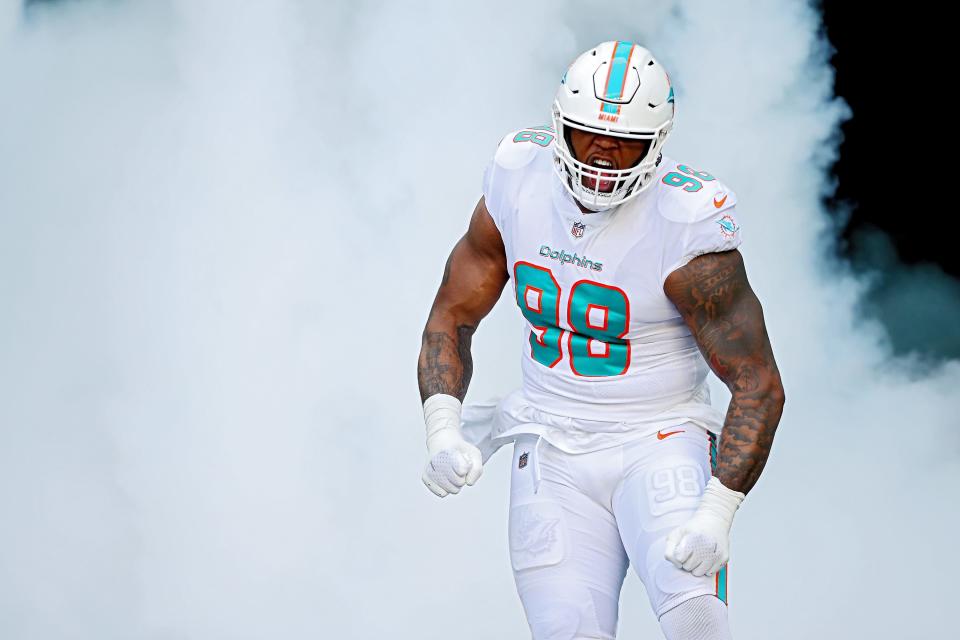 MIAMI GARDENS, FLORIDA - NOVEMBER 13: Raekwon Davis #98 of the Miami Dolphins runs onto the field prior to the game against the Cleveland Browns at Hard Rock Stadium on November 13, 2022 in Miami Gardens, Florida. (Photo by Megan Briggs/Getty Images)