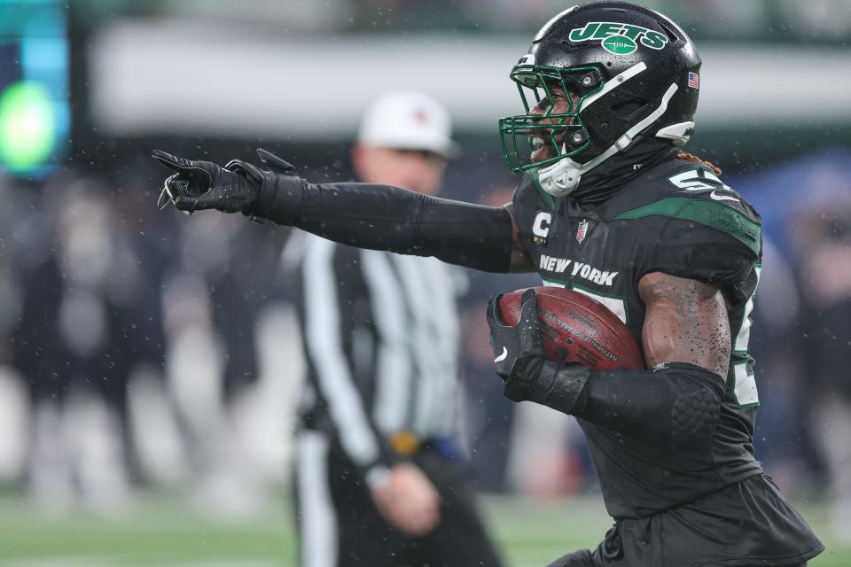 Nov 27, 2022; East Rutherford, New Jersey, USA; New York Jets linebacker C.J. Mosley (57) celebrates after his interception during the second half against the Chicago Bears at MetLife Stadium. Mandatory Credit: Vincent Carchietta-USA TODAY Sports