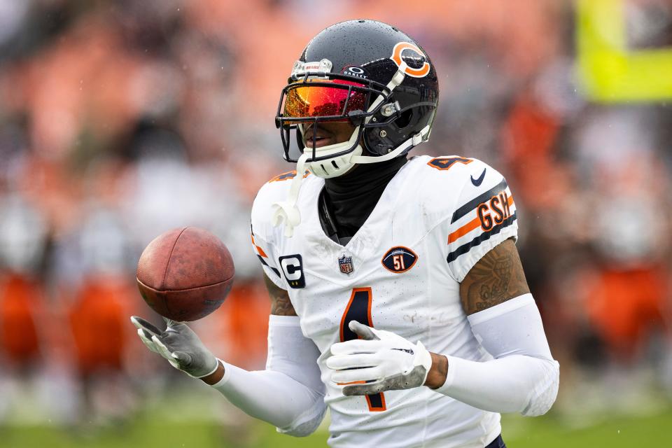 Dec 17, 2023; Cleveland, Ohio, USA; Chicago Bears safety Eddie Jackson (4) catches the ball during warm ups before the game against the Cleveland Browns at Cleveland Browns Stadium. Mandatory Credit: Scott Galvin-USA TODAY Sports