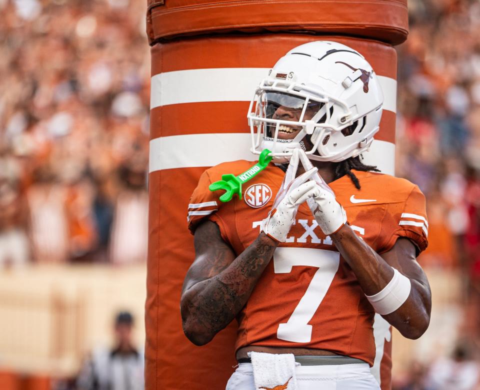 Texas Longhorns wide receiver Isaiah Bond (7) celebrates after scoring Texas' first touchdown of the game during the first quarter of the Longhorns' game against the UTSA Roadrunners at Darrell K RoyalÐTexas Memorial Stadium, Saturday, Sept. 14, 2024.