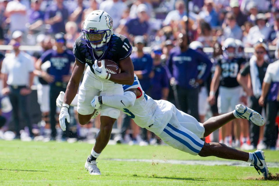 Sep 23, 2023; Fort Worth, Texas, USA; TCU Horned Frogs wide receiver JoJo Earle (11) catches a pass for a first down against the SMU Mustangs during the first half at Amon G. Carter Stadium. Mandatory Credit: Jerome Miron-USA TODAY Sports