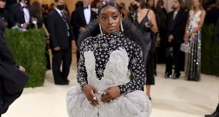 Simone Biles soars with G.O.A.T. performers on Gold Over America tour