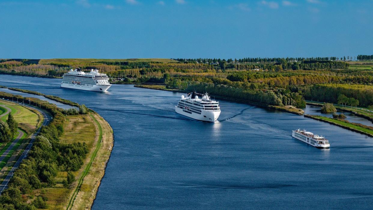 Viking Longship Mani, Expeditions ship Viking Polaris and Viking ocean ship Venus on the North Sea Canal, Amsterdam, Netherlands.