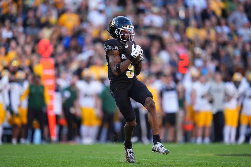 Aug 29, 2024; Boulder, Colorado, USA; Colorado Buffaloes wide receiver Jimmy Horn Jr. (5) catches the ball in the first half against the North Dakota State Bison at Folsom Field. Mandatory Credit: Ron Chenoy-USA TODAY Sports