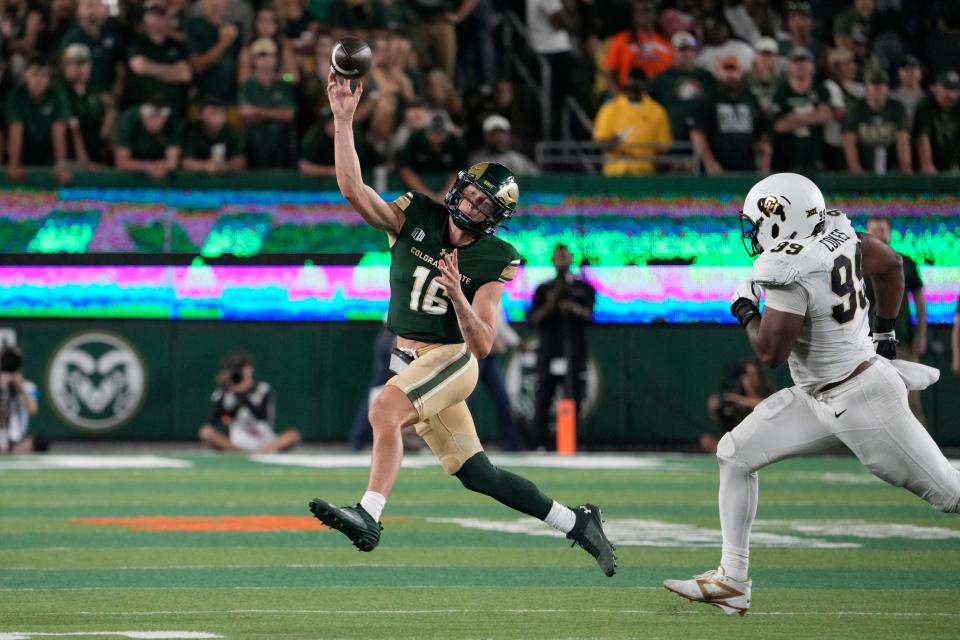 Sep 14, 2024; Fort Collins, Colorado, USA; Colorado State Rams quarterback Brayden Fowler-Nicolosi (16) throws on the run while Colorado Buffaloes defensive lineman Shane Cokes (99) chases at Sonny Lubick Field at Canvas Stadium. Mandatory Credit: Michael Madrid-Imagn Images