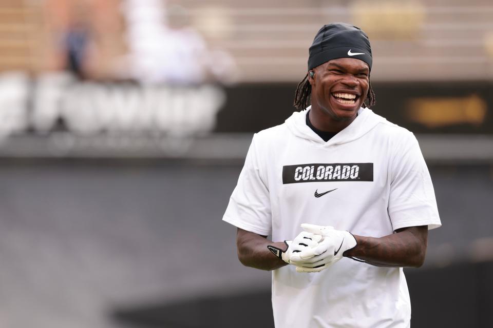 BOULDER, COLORADO - AUGUST 29: Travis Hunter #12 of the Colorado Buffaloes reacts while warming up prior to the game against the North Dakota State Bison at Folsom Field on August 29, 2024 in Boulder, Colorado. (Photo by Andrew Wevers/Getty Images)