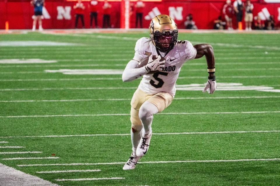 Sep 7, 2024; Lincoln, Nebraska, USA; Colorado Buffaloes wide receiver Jimmy Horn Jr. (5) runs against the Nebraska Cornhuskers during the fourth quarter at Memorial Stadium. Mandatory Credit: Dylan Widger-Imagn Images