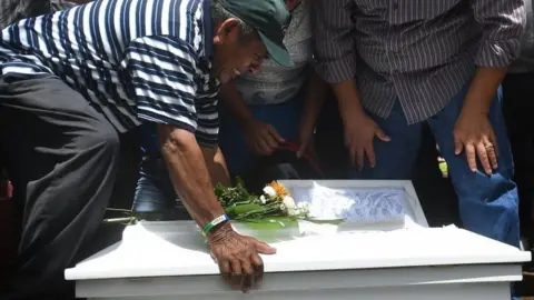 AFP Relatives of 15-month-old Teiler Lorio, who died during an attack by riot police and members of the Sandinista Youth, cries during her son's funeral at the Milagro de Dios cemetery in Managua on June 24, 2018.