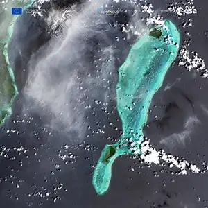 Lighthouse Reef, part of the large coral reef system off the coast of Belize in Central America. Here the famous Great Blue Hole can be seen – a giant marine sinkhole. Credit: Sentinel 2C/ESA