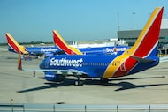 Southwest Airlines jets prepare for flights on Sept. 13, 2024, at Dallas Love Field.