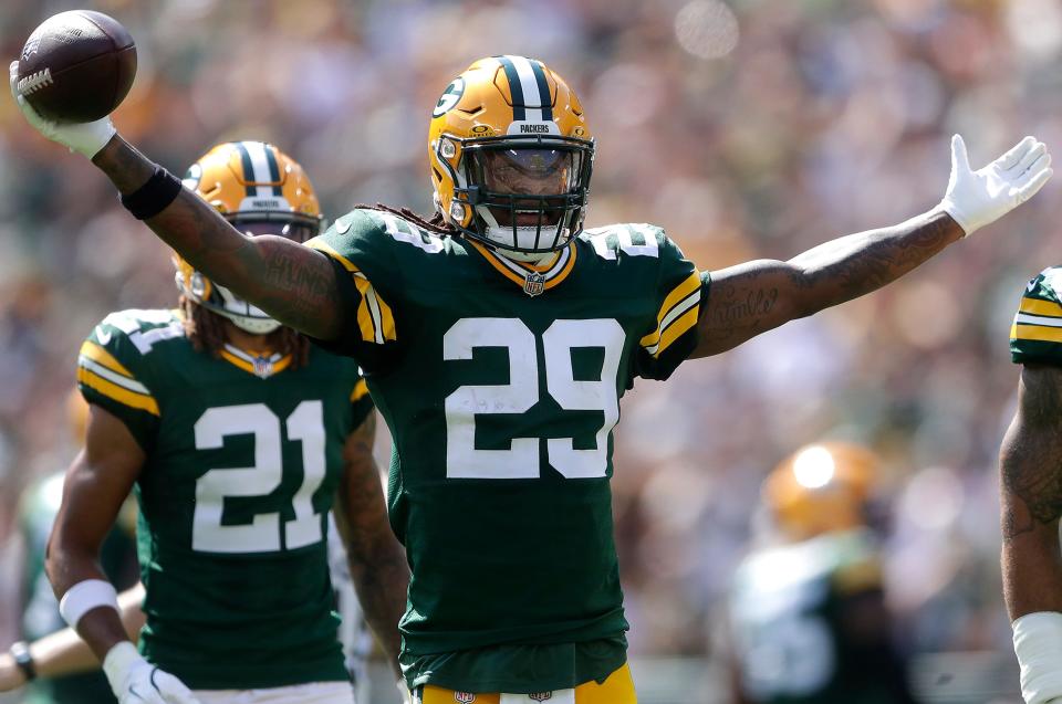 Sep 15, 2024; Green Bay, Wisconsin, USA; Green Bay Packers safety Xavier McKinney (29) celebrates a first half interception against Indianapolis Colts at Lambeau Field. Mandatory Credit: Wm. Glasheen/USA TODAY Network via Imagn Images